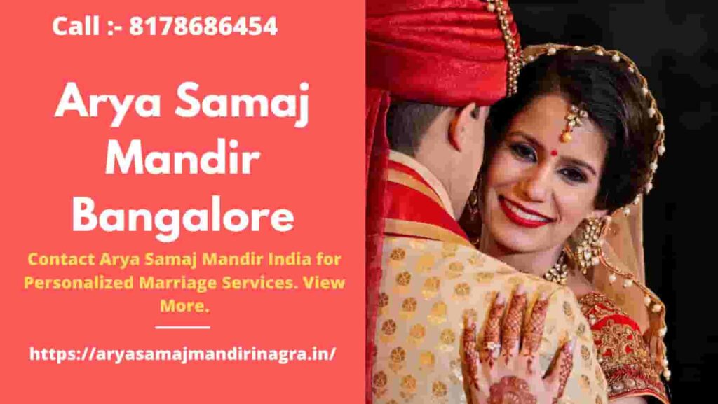 bride and groom are hugging each other and they are dressed up with hindu indian traditions wedding at Arya Samaj Mandir Bangalore